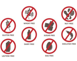 A series of food and allergens signs.